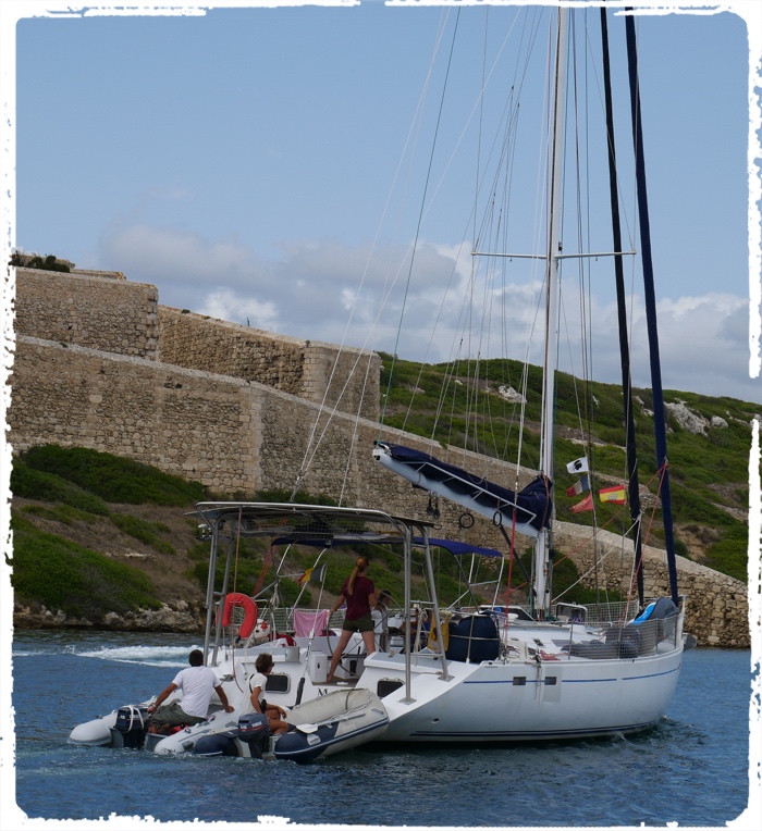 Dingy powered sailing boat